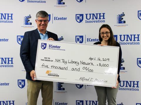 Maurice Prize presentation of giant check