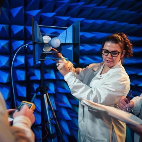 Female graduate student in sound lab